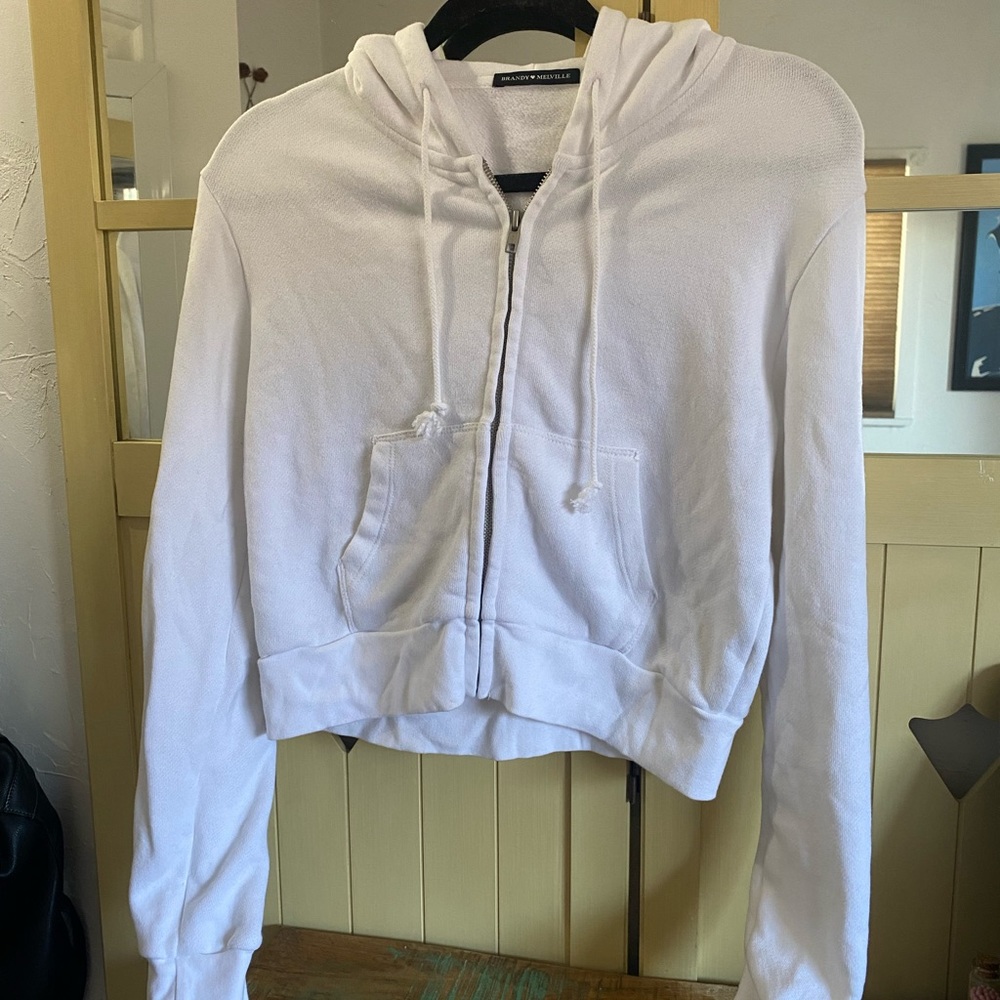 Brandy Melville white zip up cropped hoodie.